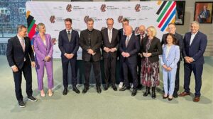 Merz unterzeichnet Vereinbarung für Olympiabewerbung